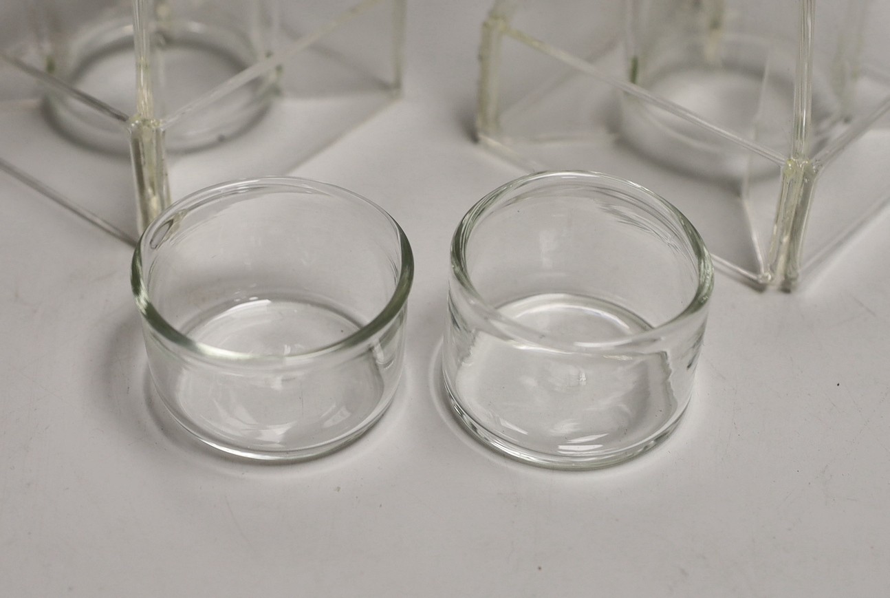 A pair of glass ‘hydrogen bomb’ shaped candleholders, 36cm tall